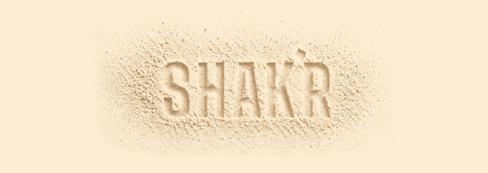 Logo SHAK'R gravé dans la poudre de protéine